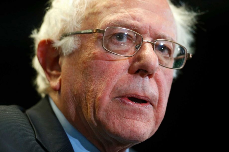 Democratic presidential candidate Sen. Bernie Sanders I-Vt. speaks at a news conference after taking a walking tour of Freddie Gray's neighborhood and meeting with African American civic and religious leaders in Baltimore Tuesday Dec. 8 2015. (AP Ph