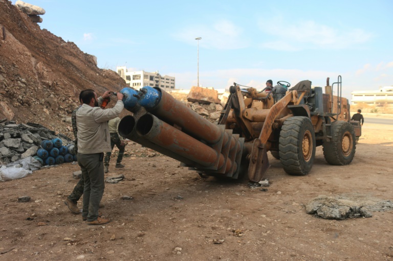 AFP  File  Ismail Abdulrahman Syrian opposition fighters from the Syrian Free Army load a home-made rocket launcher in the northern Syrian city of Aleppo