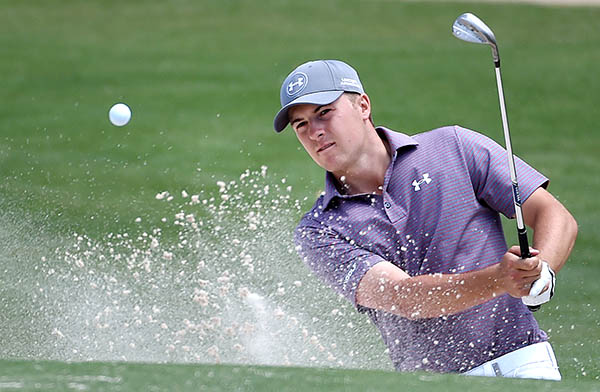 Spieth advances