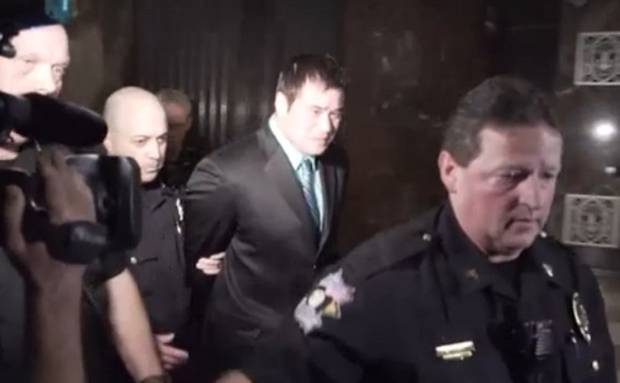 Screen cap of Daniel Holtzclaw as he's led out of the courtroom