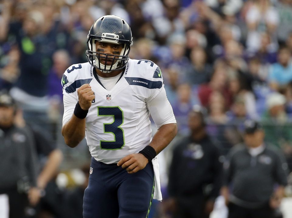 Wilson throws 5 TD passes as Seahawks beat Ravens 35-6