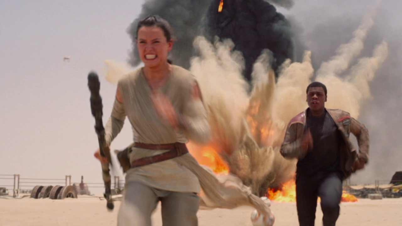 Lucasfilm shows Daisy Ridley left as Rey and John Boyega right as Finn in a scene from the film Star Wars The Force Awakens