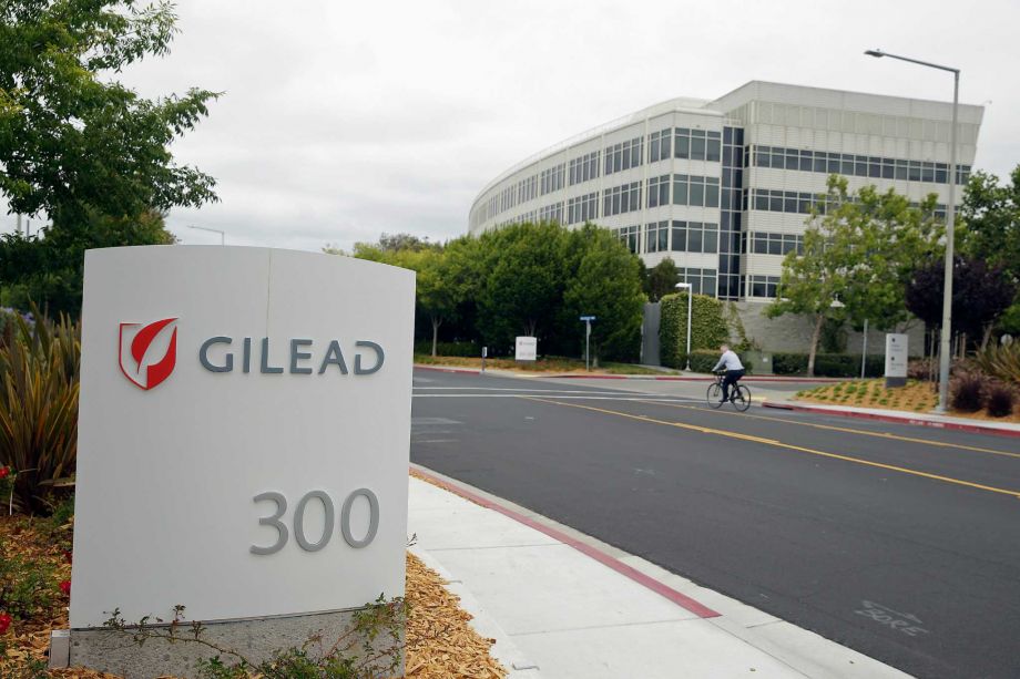 2015 a man cycles near the headquarters of Gilead Sciences in Foster City Calif. A bipartisan investigation by U.S. senators finds that the makers of a breakthrough drug for hepatitis C infection put profits before patients