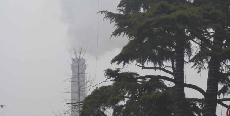 Unhealthy levels of smog hover over Beijing on Day 2 of the city's first red alert