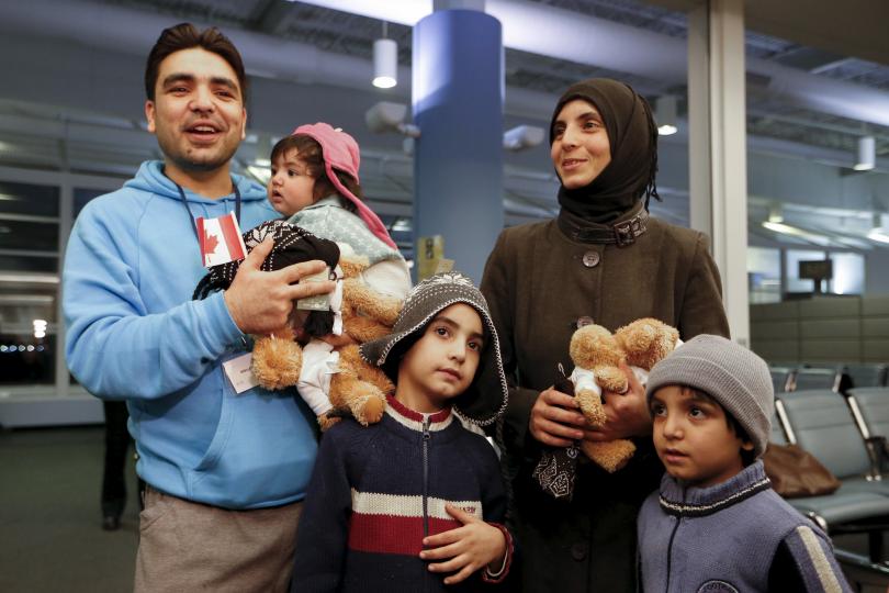 American's argue on admitting Syrian refugees, Canada welcomes more