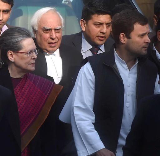 Congress President Sonia Gandhi and party Vice President Rahul Gandhi arrive amid tight security at Patiala House Courts for a hearing in National Herald Case, in New Delhi