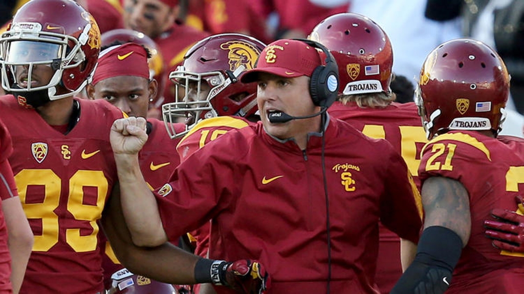 USC interim Coach Clay Helton reacts after an interception by Trojans cornerback Iman Marshall during the second half of the game against UCLA