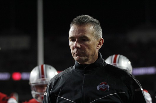 OSU coach Urban Meyer walks off the field at Ohio Stadium following the Buckeyes 17-14 loss to Michigan State on Nov. 21. Credit Samantha Hollingshead