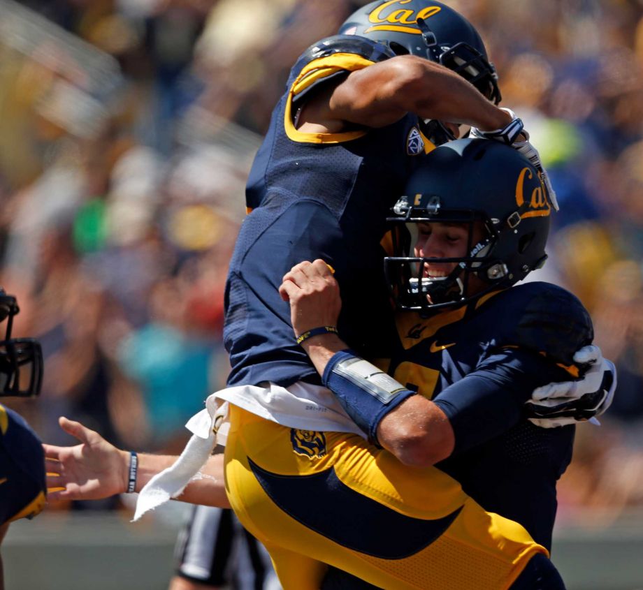 California quarterback Jared Goff celebrates with Kenny Lawler after Lawler's one-handed touchdown catch in 1st quarter against Sacramento State during NCAA College football game at Memorial Stadium in Berkeley Calif. on Saturday