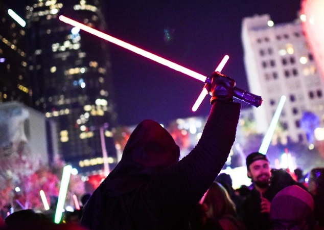 A Star Wars fan joins the melee during Lightsaber Battle LA in downtown Los Angeles