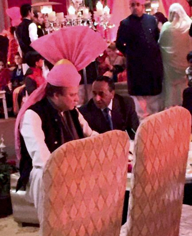 Lahore Pakistan Prime Minister Nawaz Sharif wearing pink turban gifted by Prime Minister Narendra Modi during the wedding of his granddaughter at his residence in Raiwind Lahore on Sunday. PTI