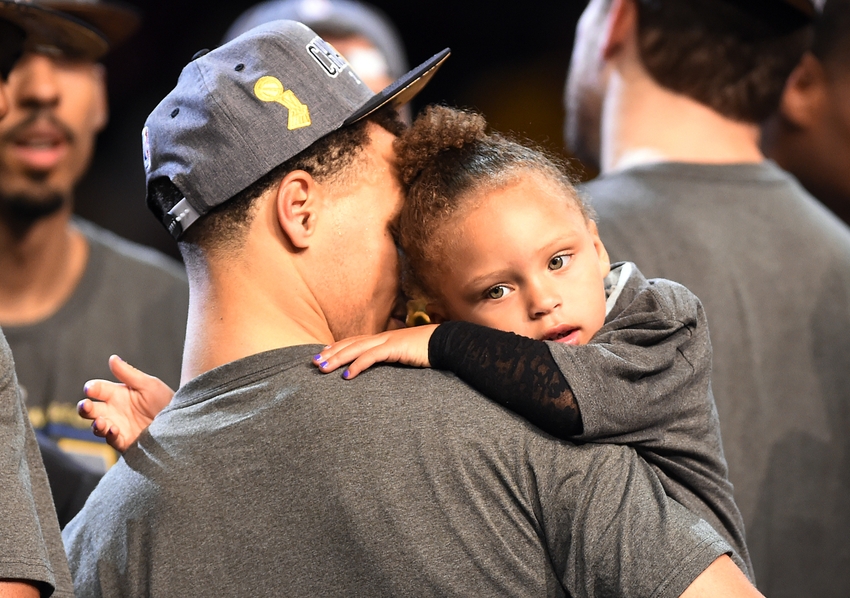 Jun 16 2015 Cleveland OH USA Golden State Warriors guard Stephen Curry holds his daughter Riley Curry after beating the Cleveland Cavaliers in game six of the NBA Finals at Quicken Loans Arena. Mandatory Credit Bob Donnan-USA TODAY Sports