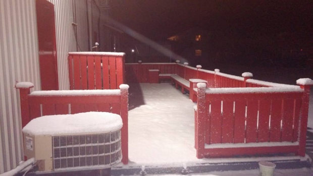 Stewart J. MacLean's red deck is edged with white Tuesday morning