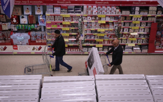 Members of the public at Tesco Extra in Sheffield this morning at 5am getting their hands on the Black Friday bargains. Tesco staggered the entry of shoppers preventing chaotic scenes like last years pre Christmas sales