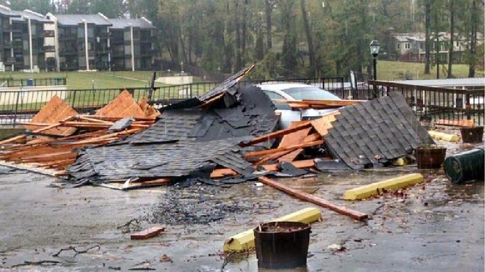 Storm damage Tuesday in Hot Springs where part of a roof was ripped from a building. Credit KATV Channel 7 News