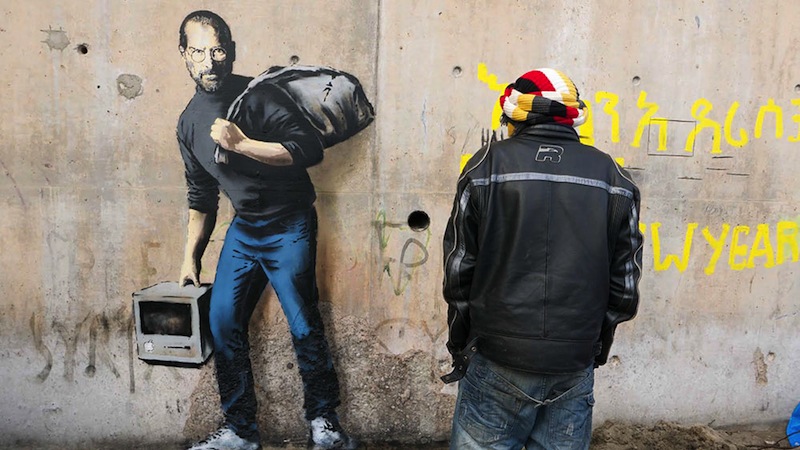 New Banksy Graffiti Depicts Steve Jobs As A Syrian Refugee