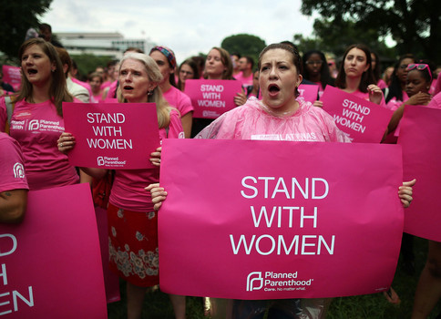 Supporters of Planned Parenthood rally outside congress