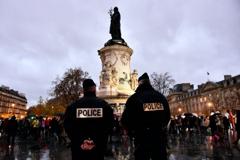 Suspect arrested over Paris attacks as raids continue across France