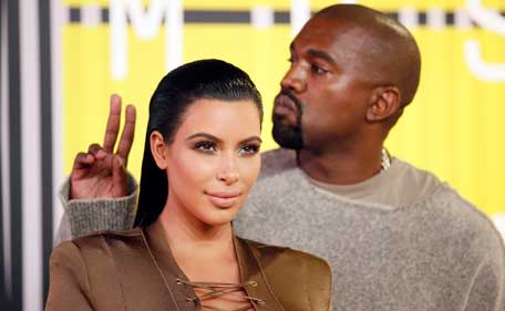 TV personality Kim Kardashian and musician Kanye West arrive at the 2015 MTV Video Music Awards in Los Angeles California