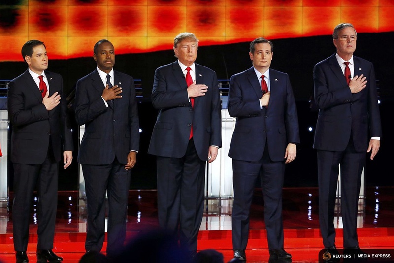 GOP presidential hopefuls Marco Rubio Ben Carson Donald Trump Ted Cruz and Jeb Bush pledge allegiance at the CNN debate in Las Vegas Nevada on Dec. 15 2105