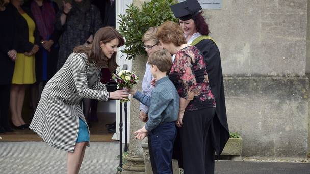 The Duchess of Cambridge receives a bouquet as she leaves Action on Addiction's Centre for Addiction Treatment Studies in Warminster Wiltshire