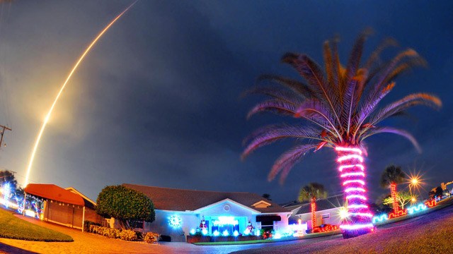 The SpaceX Falcon 9 rocket lifts off over Cocoa Beach Fla. at Cape Canaveral Air Force Station. AP