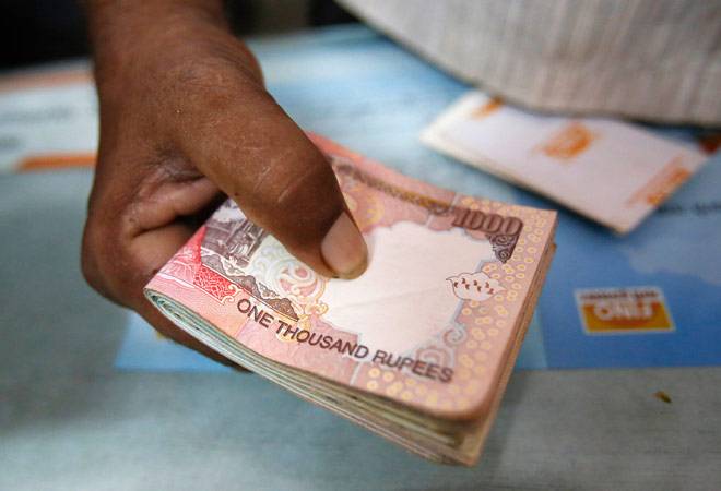 Rupee extends losses drops 6 paise at 66.65