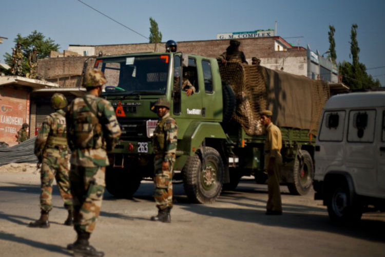 The terrorists travelling in the van got down and hurled a grenade at a CRPF camp adjacent to the check post and opened fire at the main gate