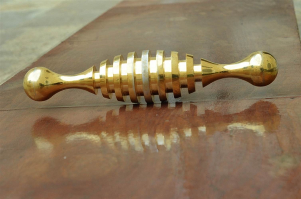 This mysterious shiny gold object was found on the grounds of a Jerusalem cemetery.
      Israel Antiquities Authority