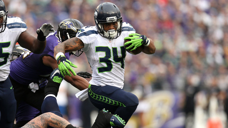 Thomas Rawls runs against the Ravens before suffering a 'substantial&#039 ankle injury