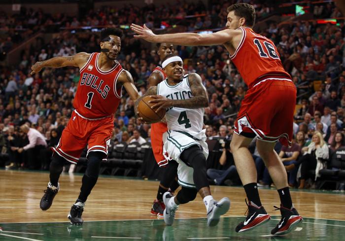 Dec 9 2015 Boston MA USA Boston Celtics guard Isaiah Thomas drives the ball against Chicago Bulls guard Derrick Rose and center Pau Gasol in the second half at TD Garden. Celtics defeated the Bulls 105-100. Mandatory Credit David Butler