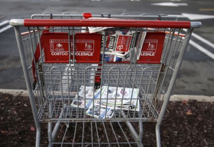 An empty shopping cart is seen in a shopping center parking lot in Westbury New York