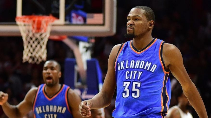 LOS ANGELES CA- DECEMBER 21 Kevin Durant #35 of the Oklahoma City Thunder reacts to his basket along with Serge Ibaka #9 in the final seconds of a 100-99 Thunder win over the Los Angeles Clippers at Staples Center