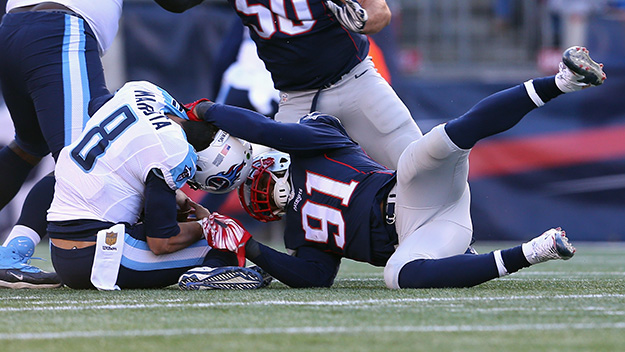 Patriots linebacker Jamie Collins sacks Tennessee Titans quarterback Marcus Mariota in the first half of an NFL football game Sunday Dec. 20 2015 in Foxborough Mass. Mariota was injured on the play. (AP