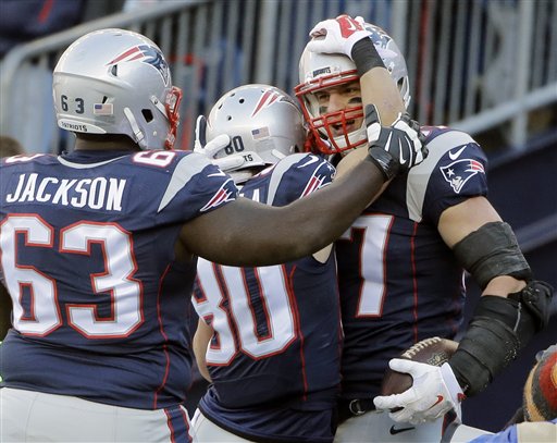 Rob Gronkowski right celebrates his touchdown catch with guard Tre&#039 Jackson 63 and wide receiver Danny Amendola.
The Associated Press