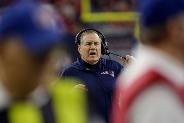 New England Patriots head coach Bill Belichick watches from the sideline during the first half of an NFL football game against the Houston Texans Sunday Dec. 13 2015 in Houston