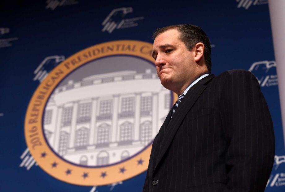 Republican presidential candidate Sen. Ted Cruz R Texas listens as he is introduced prior to speaking at the Republican Jewish Coalition Presidential Forum in Washington Thursday Dec. 3 2015