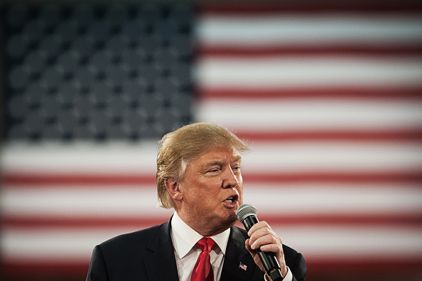 Donald Trump president and chief executive of Trump Organization Inc. and 2016 Republican presidential candidate speaks during a campaign event in Des Moines Iowa U.S. on Friday Dec. 11 2015. An Trump was taken down from a billboard advertising a