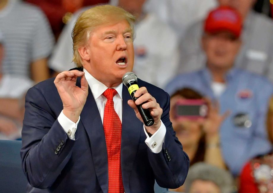 Republican presidential candidate Donald Trump speaks at a town hall meeting in the Convocation Center on the University of South Carolina Aiken campus in Aiken S.C. Trump's supporters don't see his plan to ban Musl