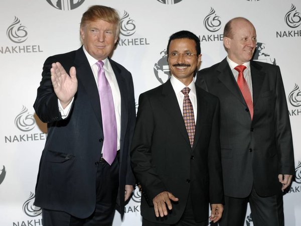 Donald Trump left His Excellency Sultan Ahmed bin Sulayem of Dubai center and then Nakheel CEO Chris O´Donnell pose together at a party thrown by Nakheel and the Trump Organization to introduce The Trump Inte