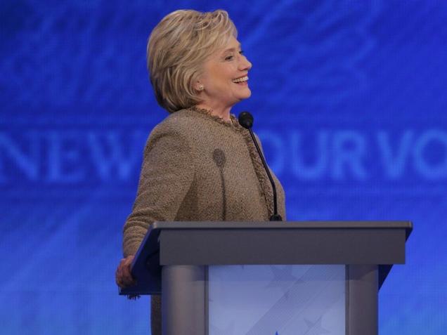 Democratic US presidential candidate Hillary Clinton smiles during the Democratic presidential candidates debate at St. Anselm College in Manchester New Hampshire