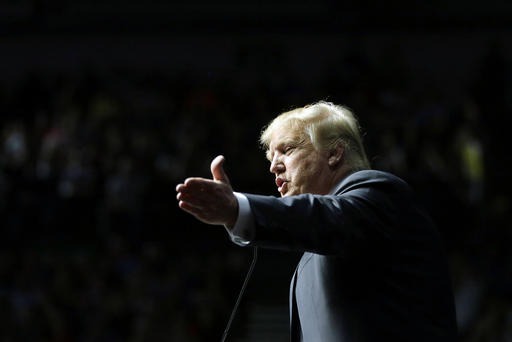 Republican presidential candidate businessman Donald Trump addresses supporters at a campaign rally Dec. 21 2015 in Grand Rapids Mich