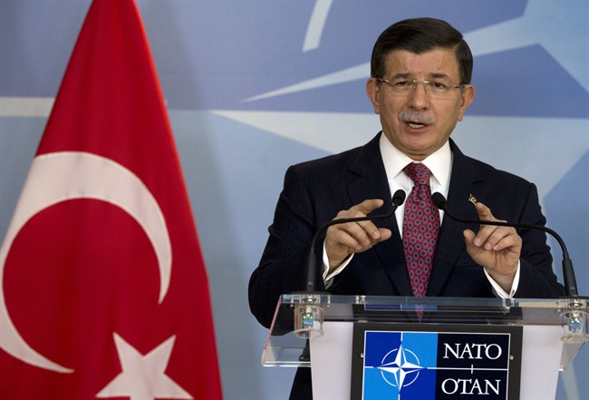 Turkish Prime Minister Ahmet Davutoglu speaks during a media conference at NATO headquarters in Brussels on Monday Nov. 30 2015. NATO Secretary General Jens Stoltenberg met with the Turkish prime minister on Monday to discuss the issue of a Russian warp