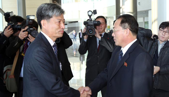 Korean officials meet in fresh bid to improve ties