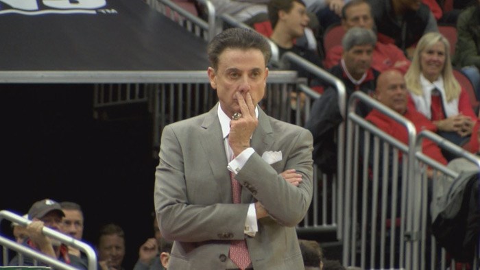 UofL men's basketball coach Rick Pitino denies making an obscene gesture toward University of Kentucky fans as he walked to the locker room after his team's loss Saturday