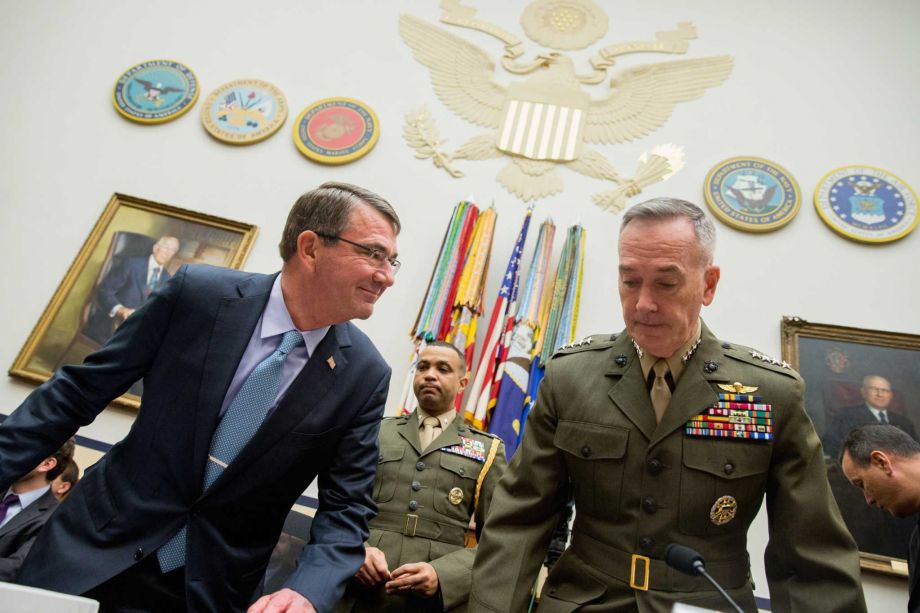 Defense Secretary Ash Carter left and Joint Chiefs Chairman Gen. Joseph Dunford Jr. arrive on Capitol Hill in Washington Tuesday Dec. 1 2015 to testify before the House Armed Services Committee hearing on the U.S. Strategy for Syria and Iraq and its