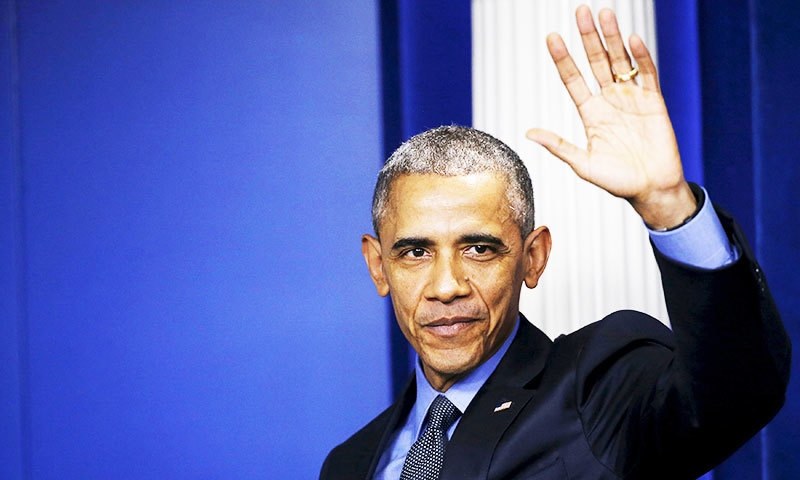 US President Barack Obama waves as he leaves his end of the year news conference at the White House in Washington.—Reuters