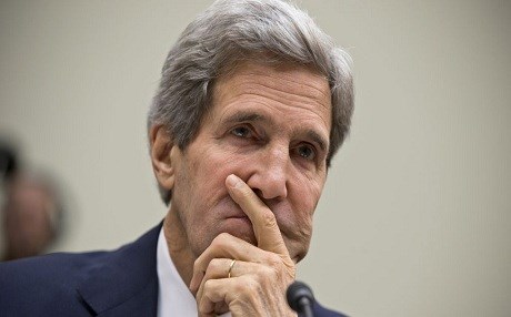 US Secretary of State John Kerry speaks to his Russian counterpart Sergey Lavrov before the start of the meeting on Syria in New York yesterday