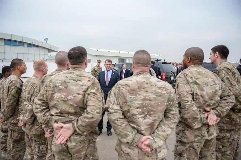 U.S. Defense Secretary Ash Carter speaks with troops during a visit to Irbil Iraq Dec. 17 2015. Carter is on a weeklong trip to the Middle East to meet with military leaders and thank troops for their service and sacrifice especially during the holida