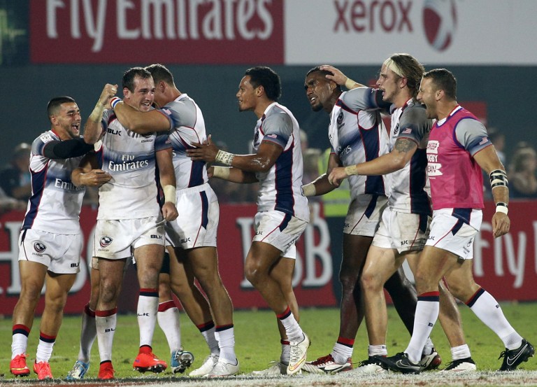 United States players celebrate after winning their rugby match against New Zealand